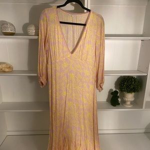 Vici Dress: pink with yellow floral, v-neck maxi with slight high and low bottom